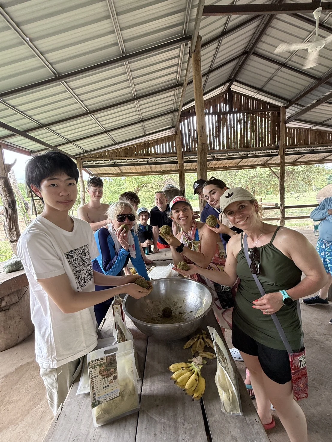 Preparing supplements together at Elephants World