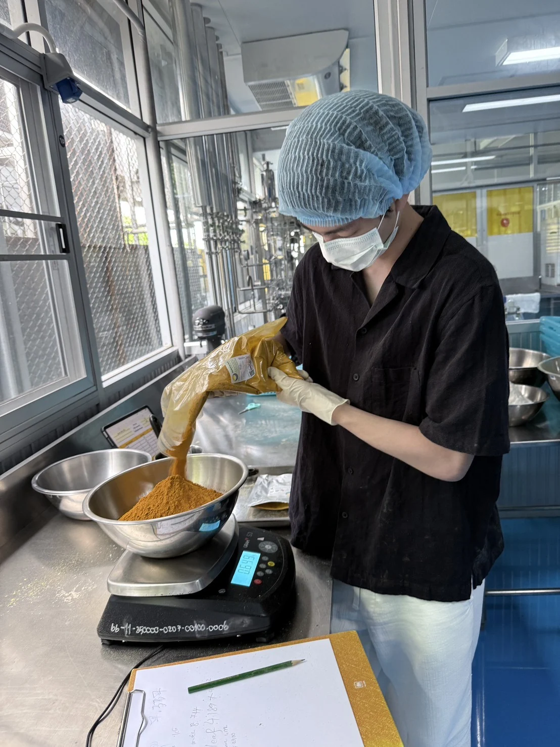 Weighing ingredients at the laboratory workbench