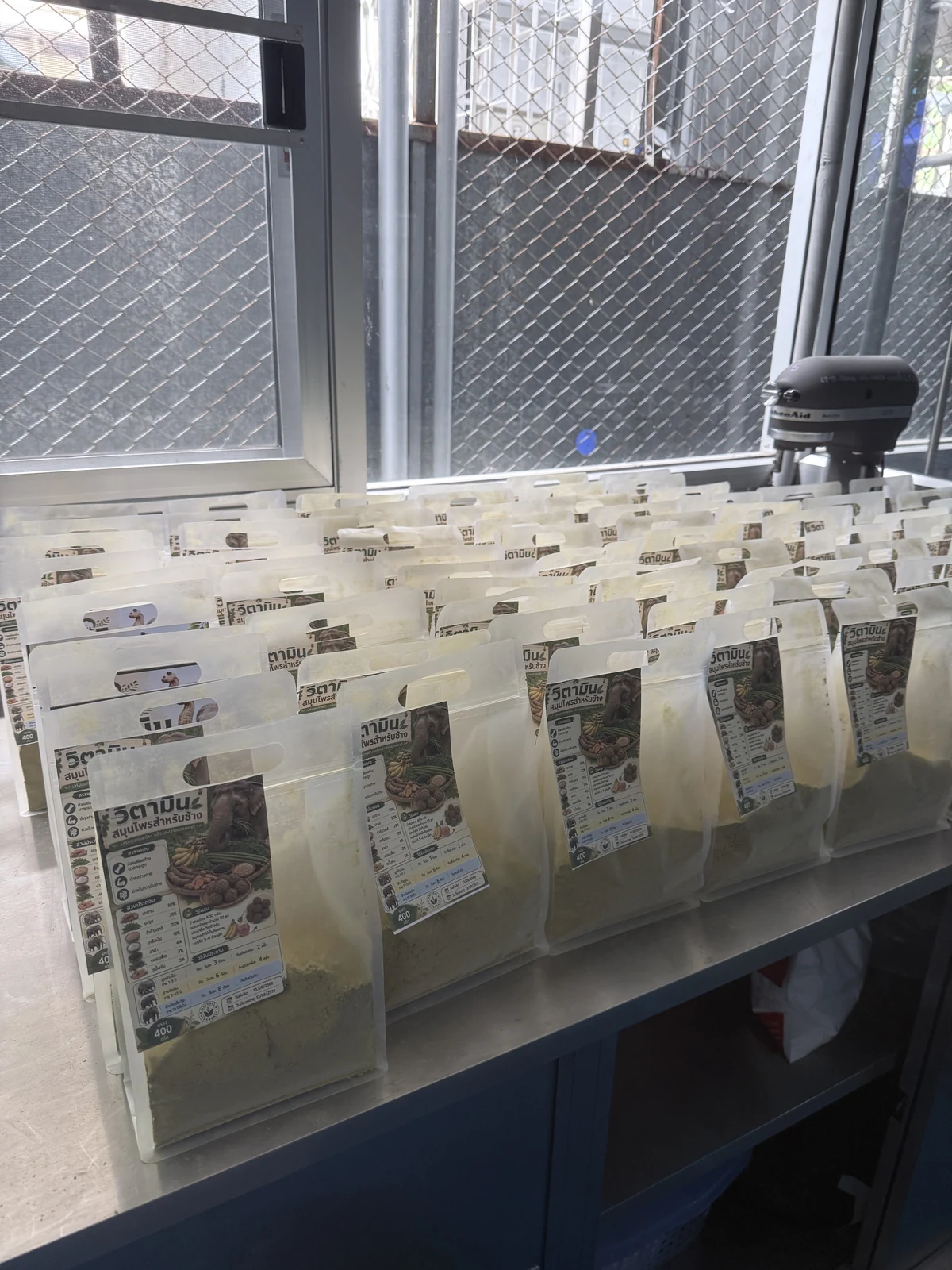 Prepared supplement pouches arranged in rows